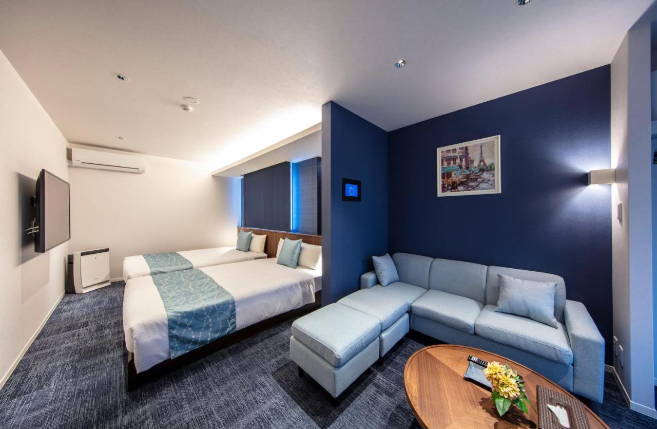 Grand Base Okayama Ekimae Aparthotel Екстериор снимка