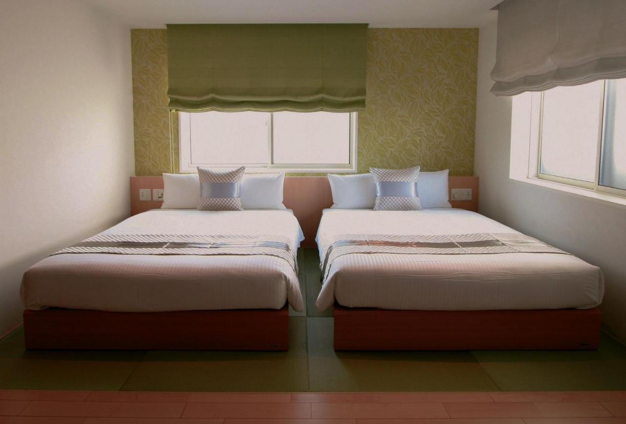 Grand Base Okayama Ekimae Aparthotel Екстериор снимка