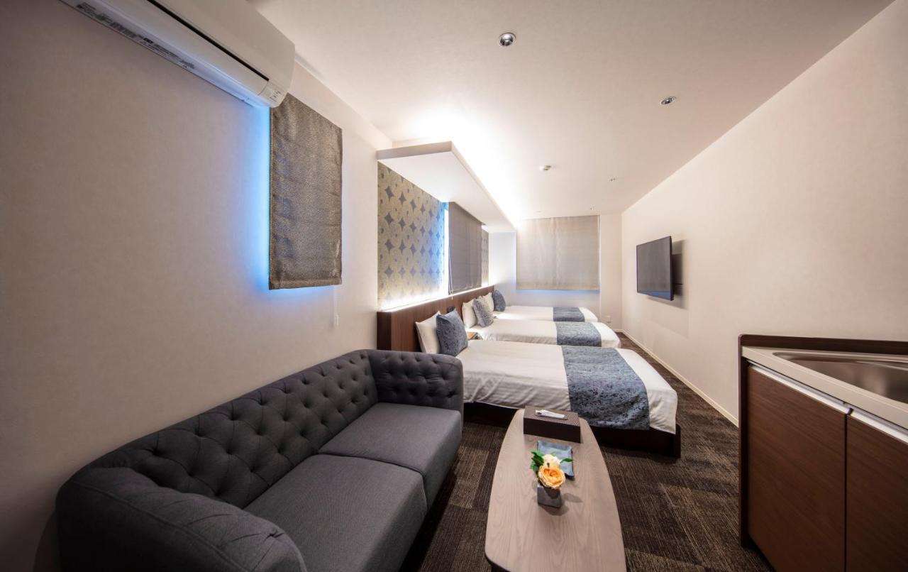 Grand Base Okayama Ekimae Aparthotel Екстериор снимка