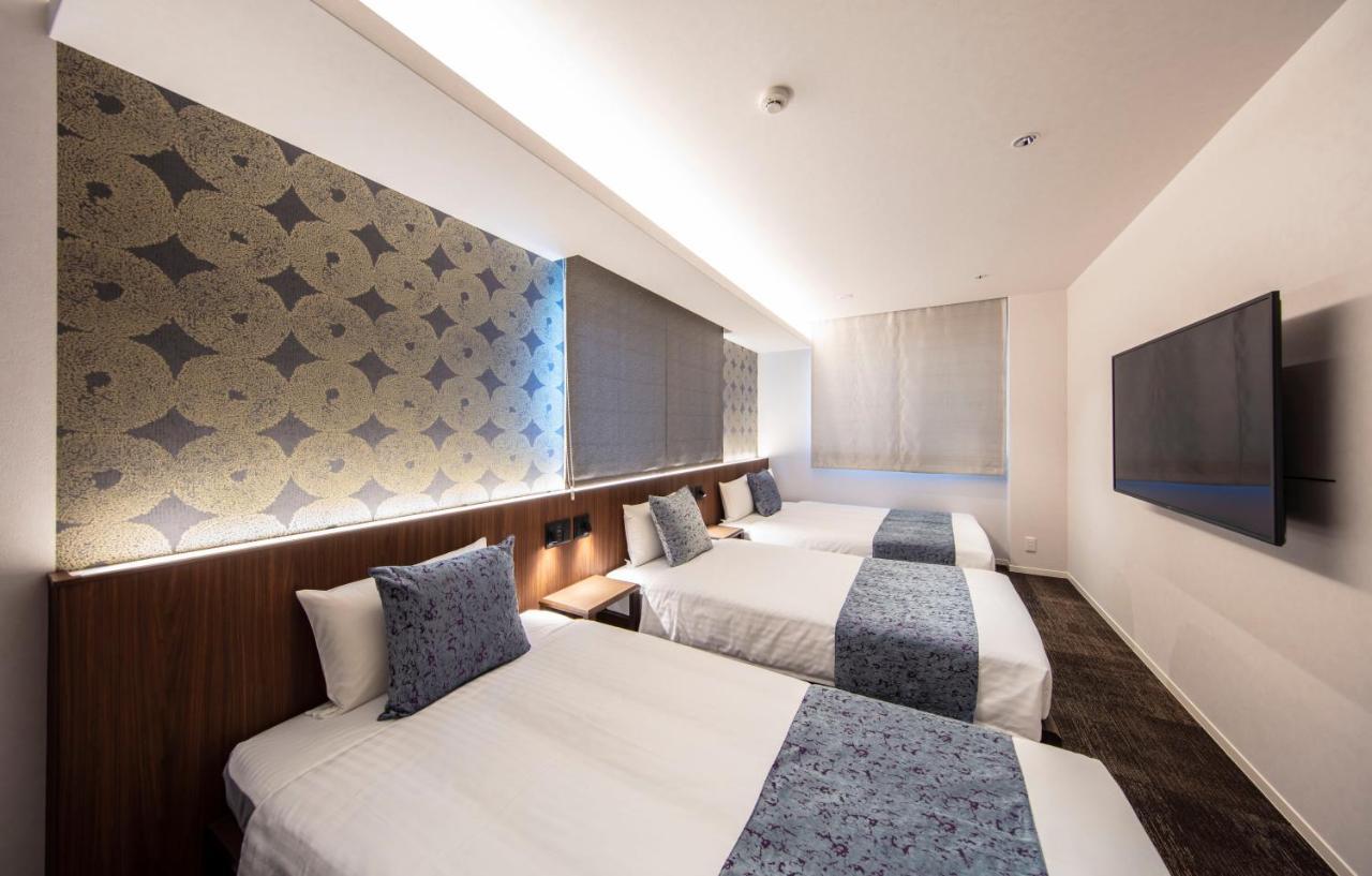 Grand Base Okayama Ekimae Aparthotel Екстериор снимка