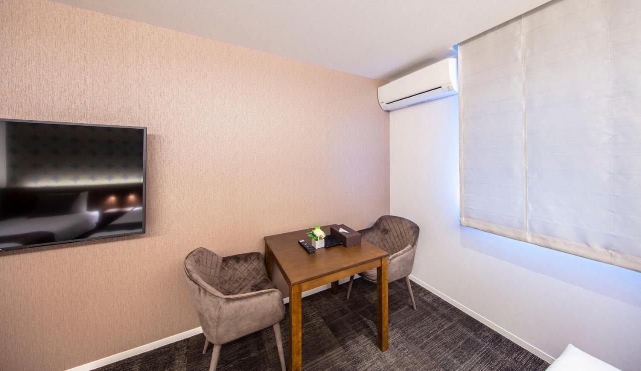 Grand Base Okayama Ekimae Aparthotel Екстериор снимка