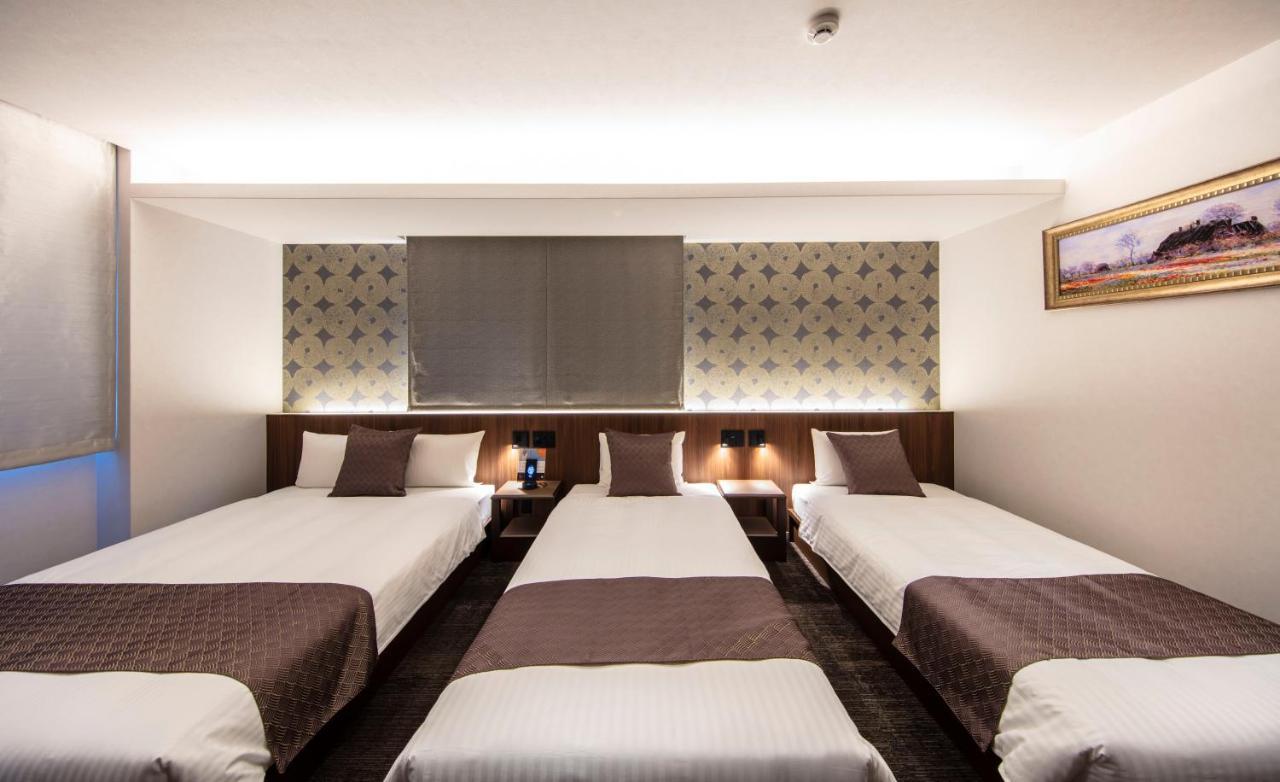 Grand Base Okayama Ekimae Aparthotel Екстериор снимка