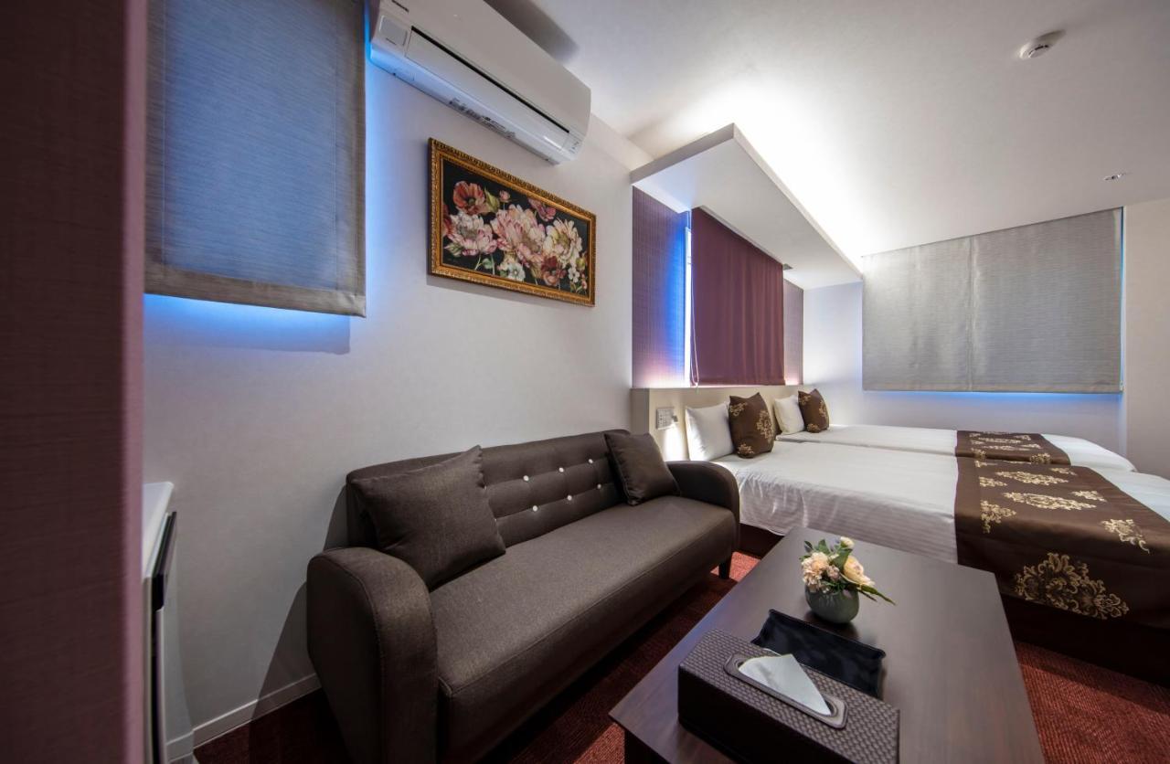 Grand Base Okayama Ekimae Aparthotel Екстериор снимка