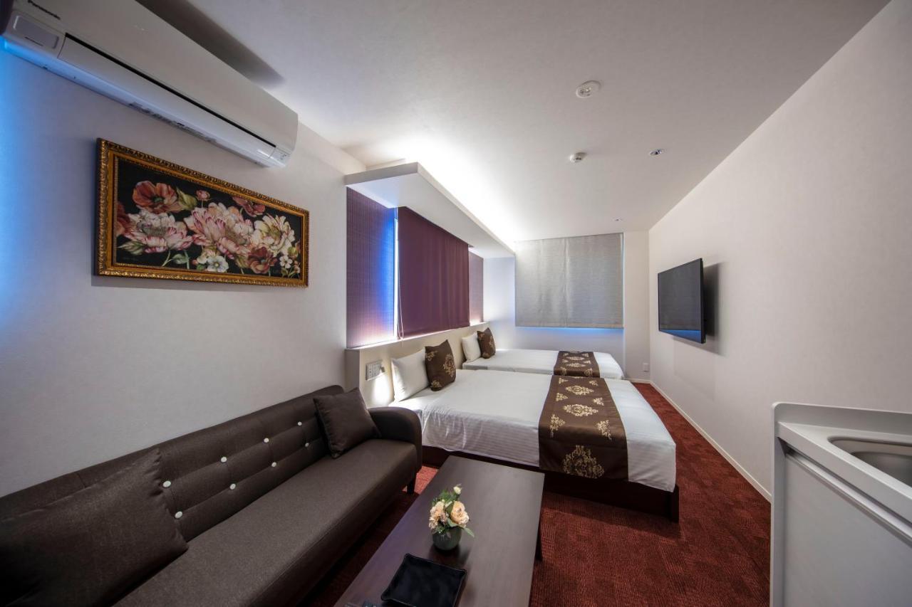 Grand Base Okayama Ekimae Aparthotel Екстериор снимка