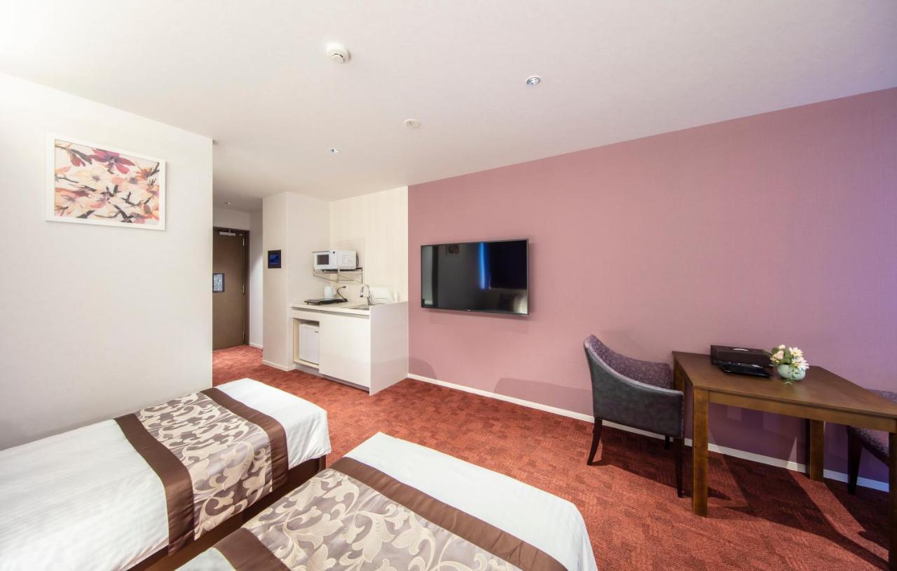 Grand Base Okayama Ekimae Aparthotel Екстериор снимка