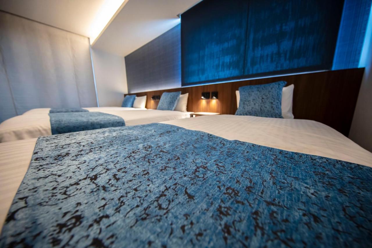 Grand Base Okayama Ekimae Aparthotel Екстериор снимка
