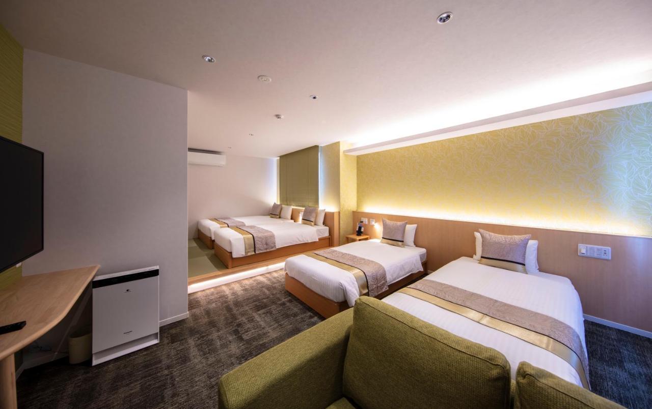 Grand Base Okayama Ekimae Aparthotel Екстериор снимка
