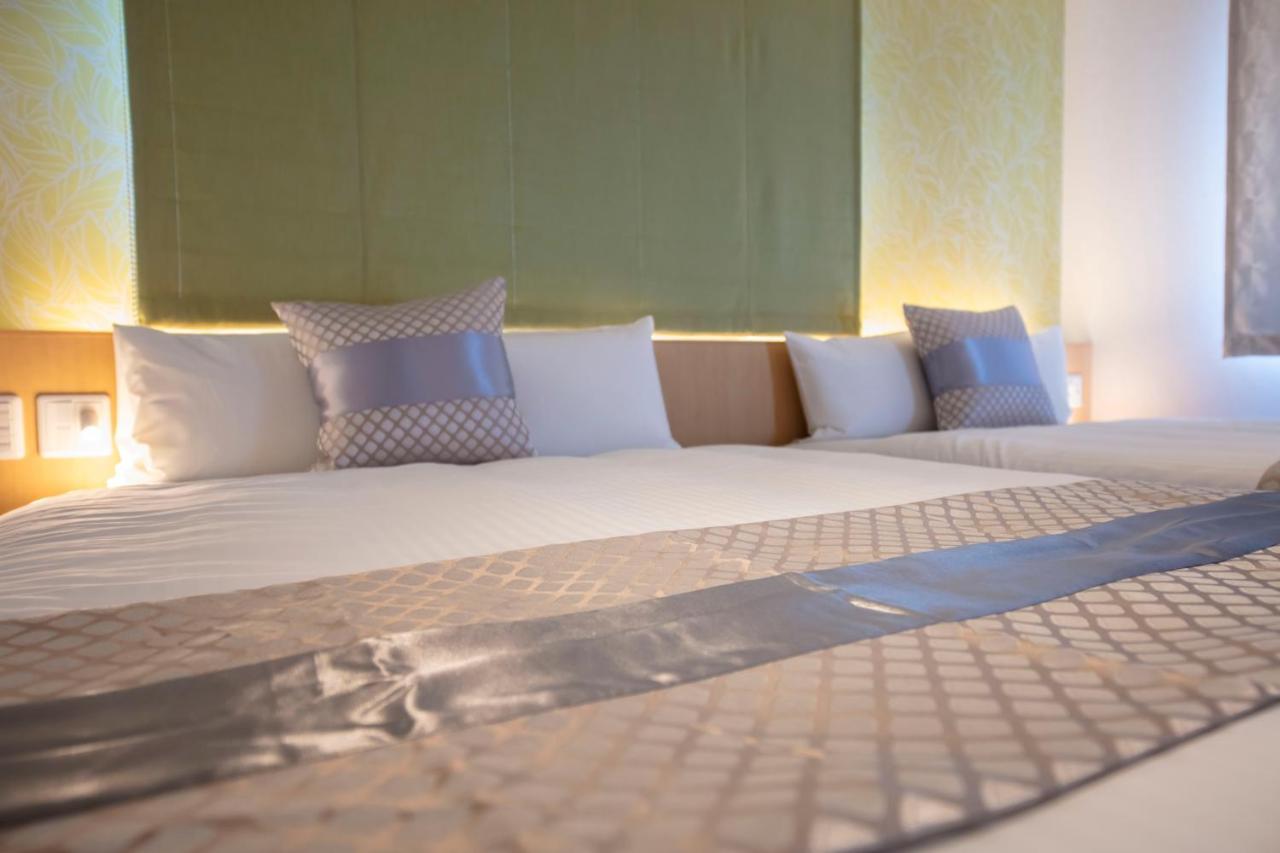 Grand Base Okayama Ekimae Aparthotel Екстериор снимка
