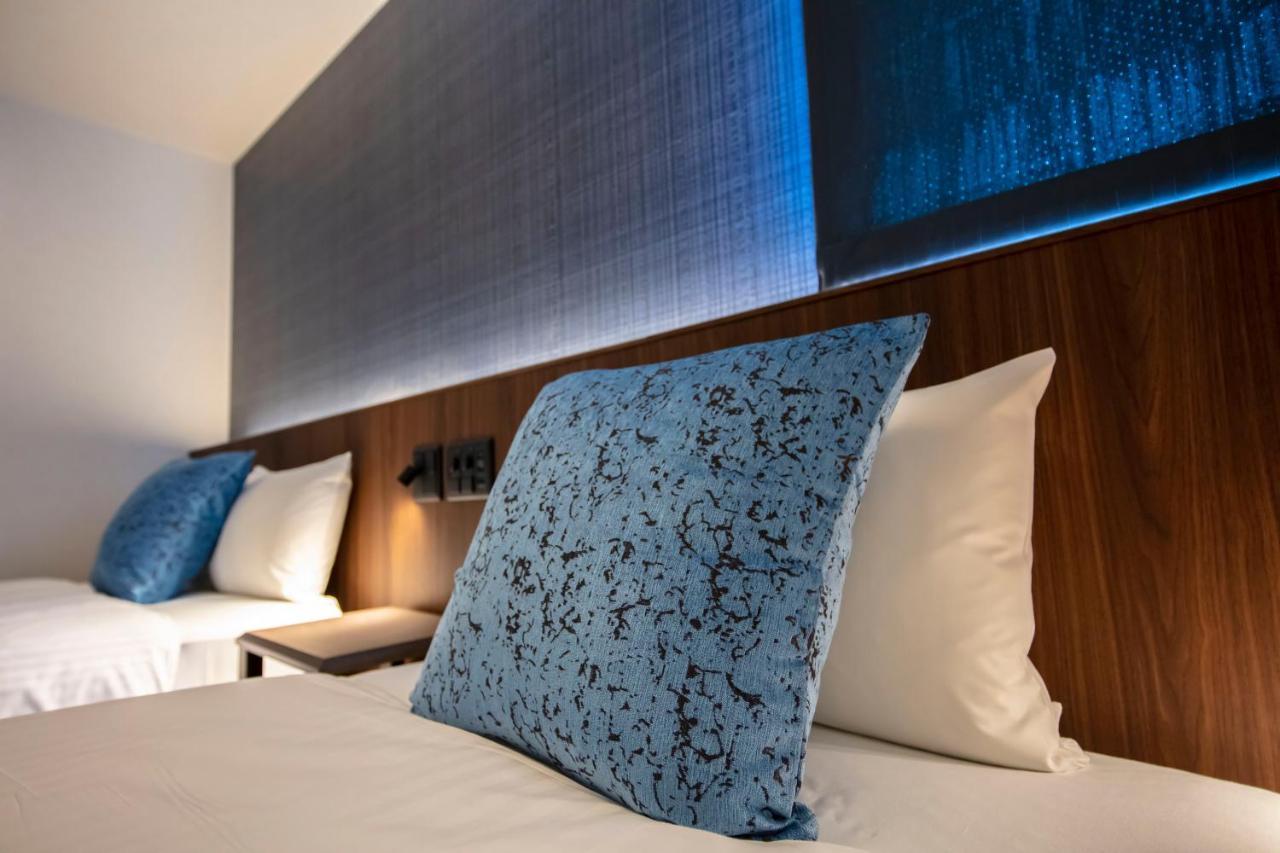 Grand Base Okayama Ekimae Aparthotel Екстериор снимка