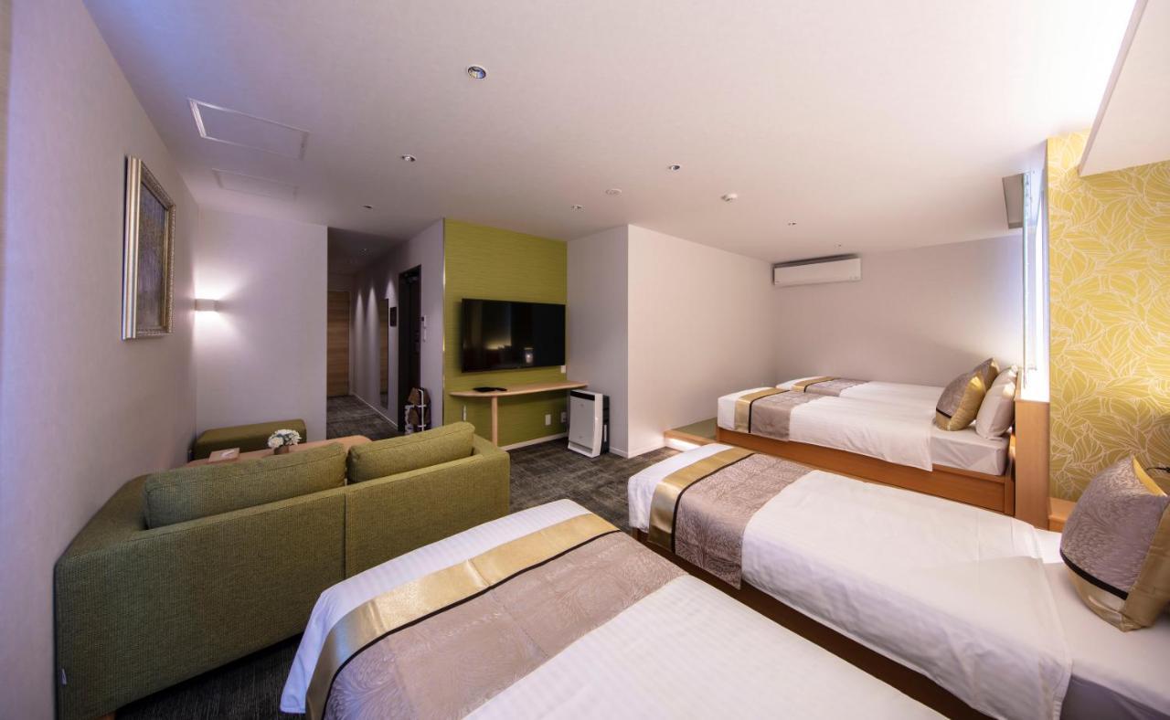 Grand Base Okayama Ekimae Aparthotel Екстериор снимка