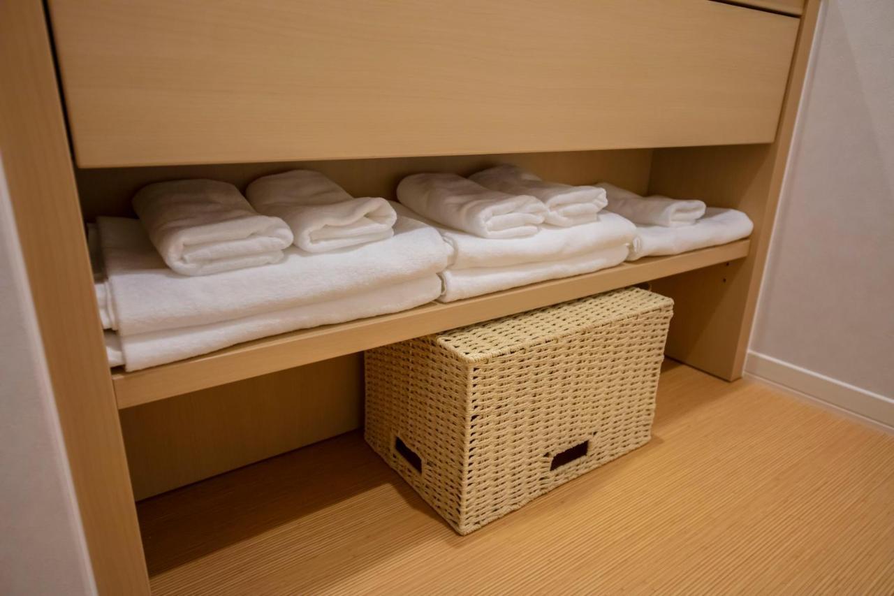 Grand Base Okayama Ekimae Aparthotel Екстериор снимка