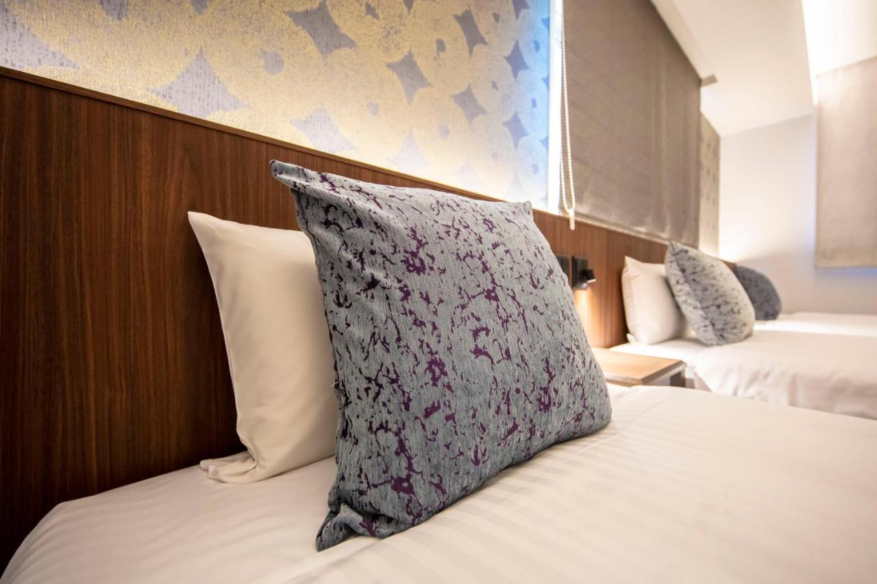 Grand Base Okayama Ekimae Aparthotel Екстериор снимка