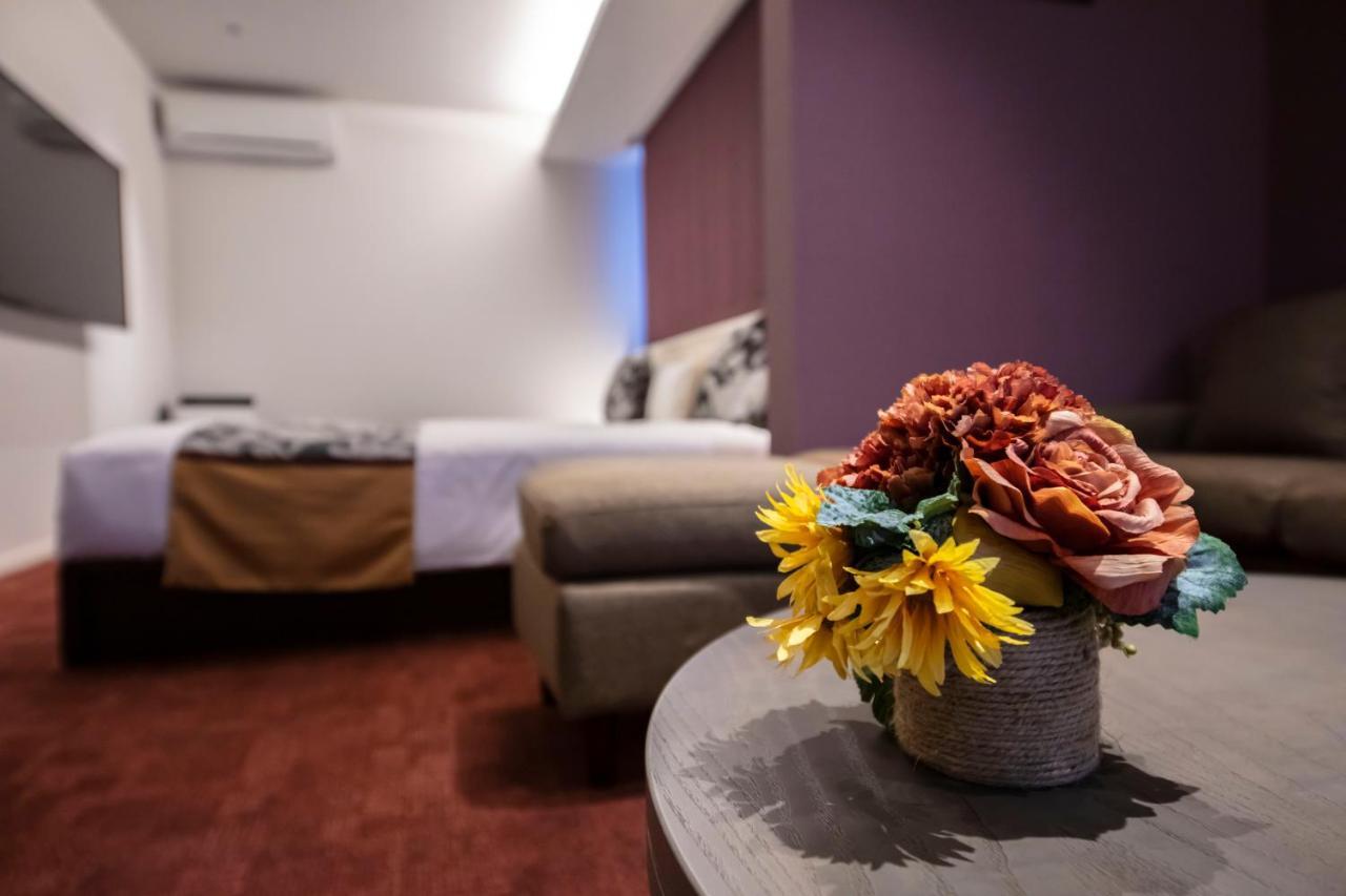 Grand Base Okayama Ekimae Aparthotel Екстериор снимка